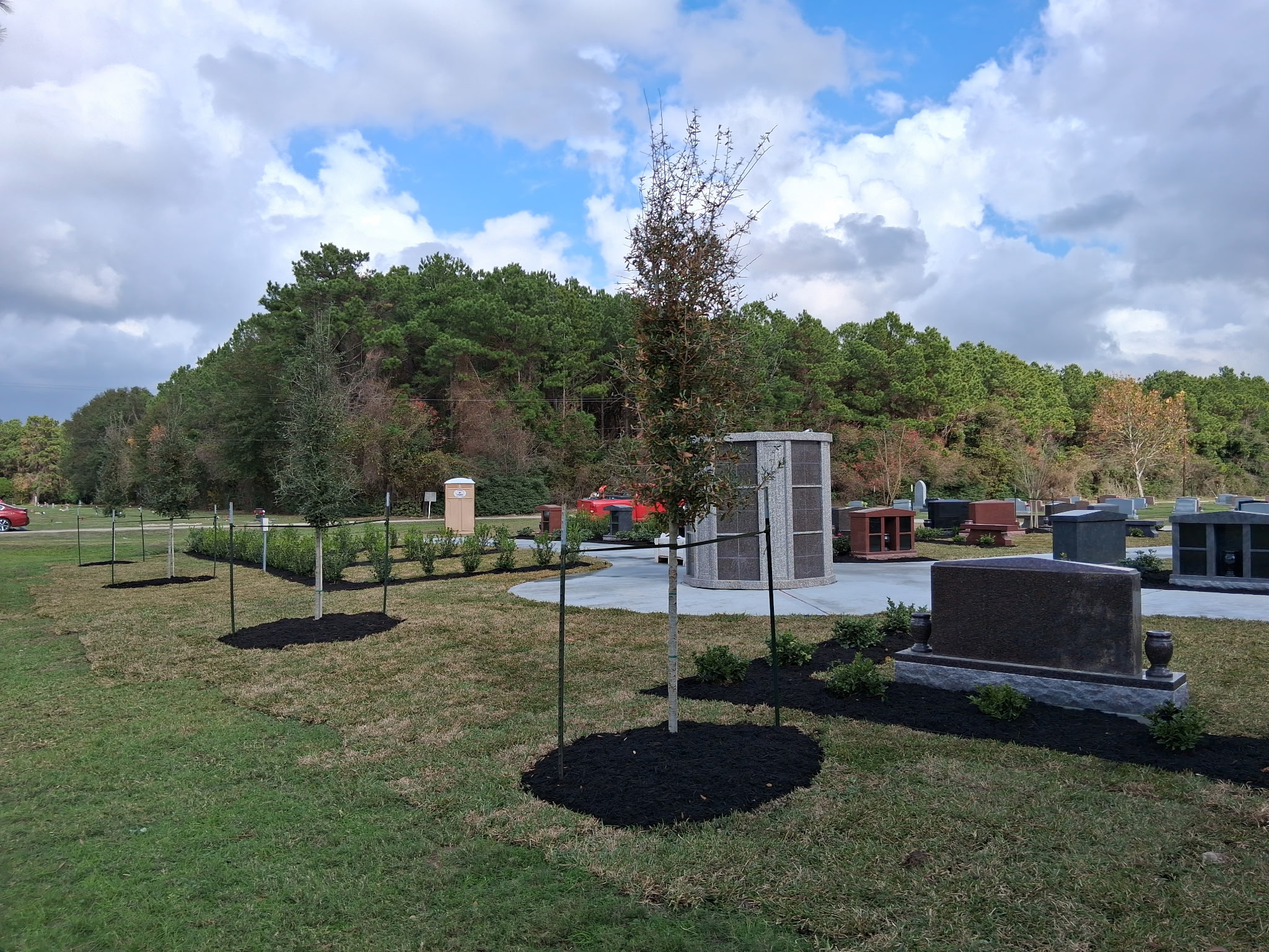 Cemetery grounds after irrigation system installation showing healthy turf