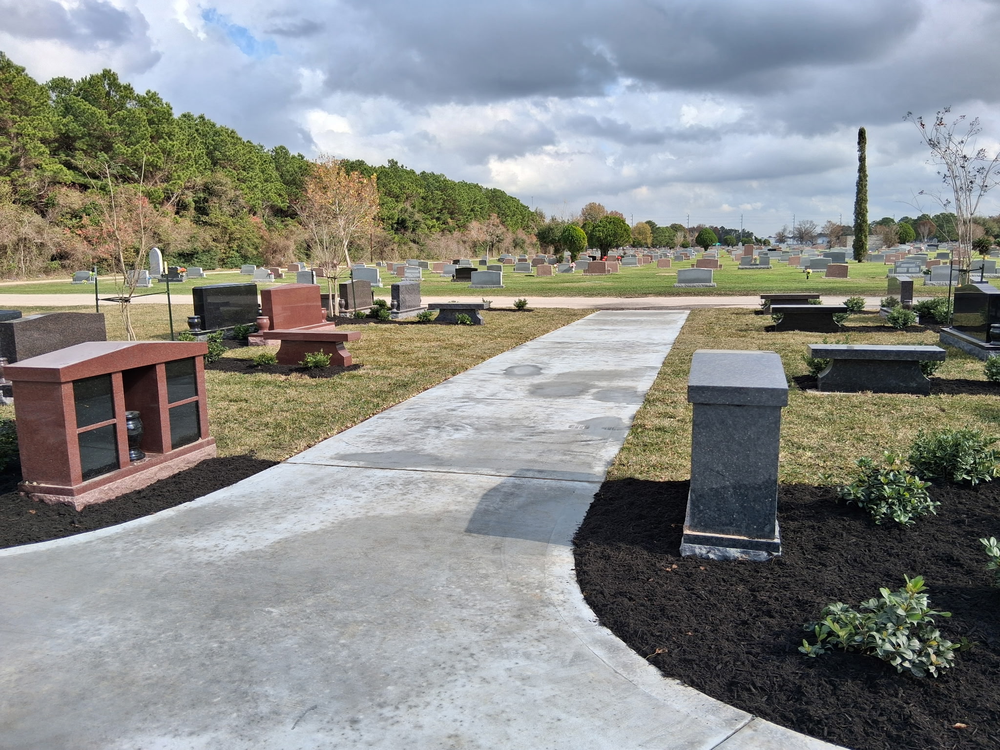 Cemetery monument area after professional restoration and maintenance